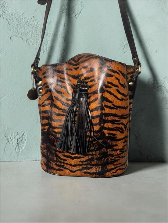 Patricia Nash Handbags - Patricia Nash Tiger Print Leather Bucket Crossbody